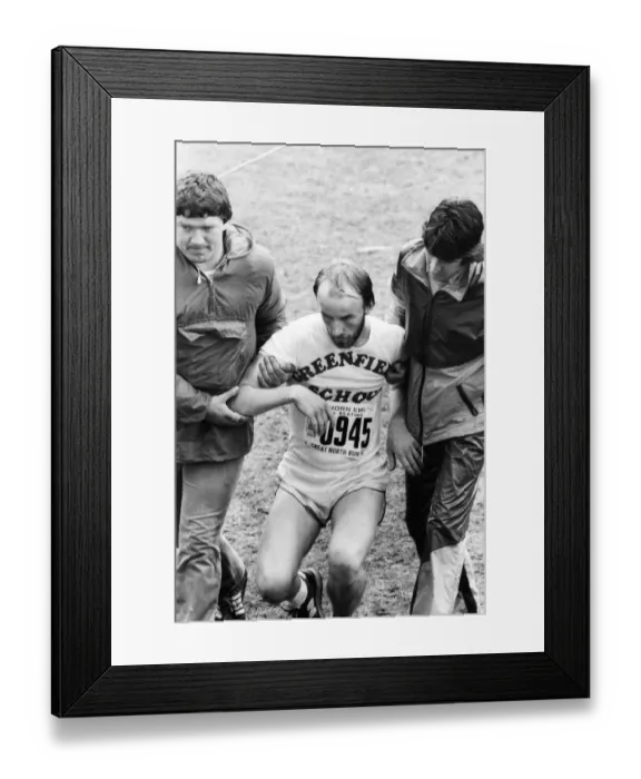 Framed Print : The Great North Run 27 June 1982 - An exhausted runner is helped by volunteers
