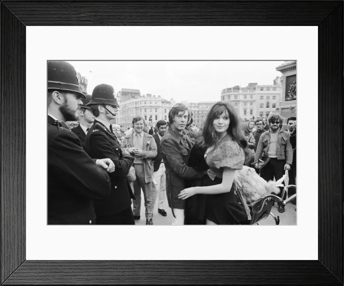 Framed Print : Actress and former model Madeline Smith was forcibly moved on by the law in company with Framed Print : Actress and former model Madeline Smith was forcibly moved on by the law in company with