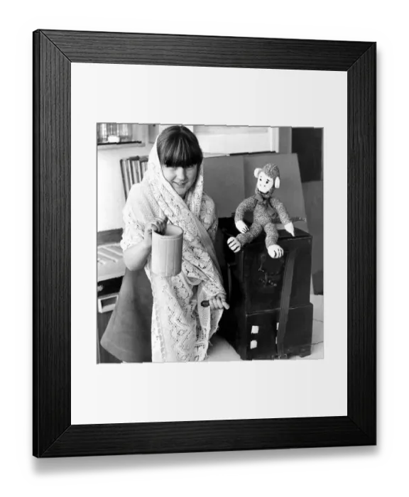 Framed Print : Ten year old Rhonda Edwards of South Beach County Primary School with an old Italian Framed Print : Ten year old Rhonda Edwards of South Beach County Primary School with an old Italian