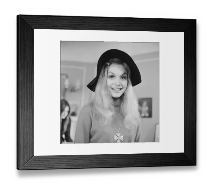 Framed Print : Model and actress Madeline Smith attends the launch of the new Alma 69