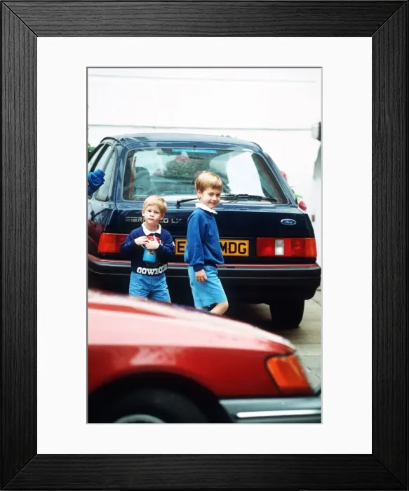 Framed Print : Prince Harry returns to school at Chepstow Villas Notting Hill Gate with brother Prince