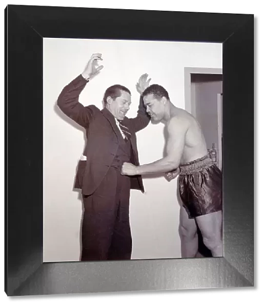 Joe Louis with Peter Wilson SP at Earls Court Boxer boxing