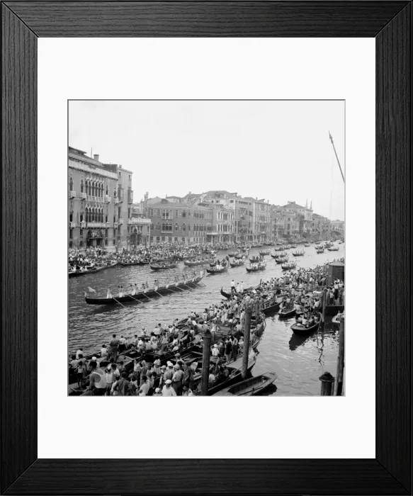 Framed Print : A procession of the gondolas pass along the Grand Canal after the race of the nine Framed Print : A procession of the gondolas pass along the Grand Canal after the race of the nine
