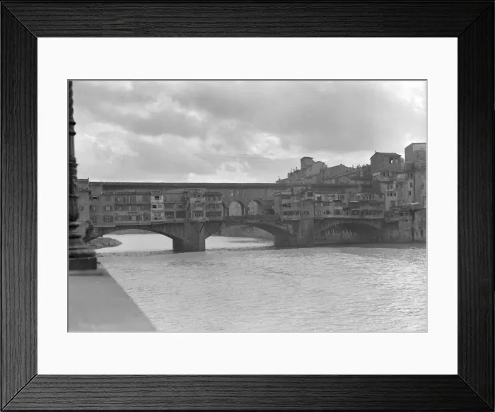 Framed Print : The Ponte Vecchio crossing the River Arno in Florence Circa 1925 Framed Print : The Ponte Vecchio crossing the River Arno in Florence Circa 1925