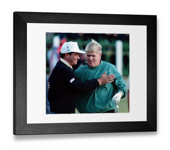Framed Print : John Daly is congratulated by Constantino Rocca after his victory in the play offs for