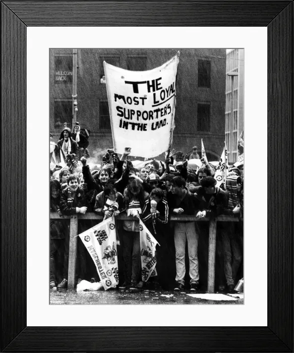 Framed Print : Manchester United fans line the streets as they await the return of their team following Framed Print : Manchester United fans line the streets as they await the return of their team following