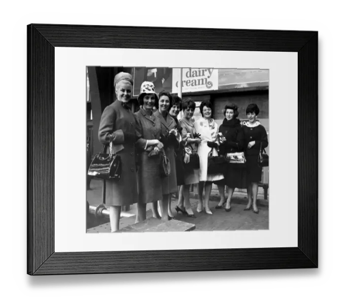 Framed Print : Manchester United wives arrive at St. Pancreas railway station