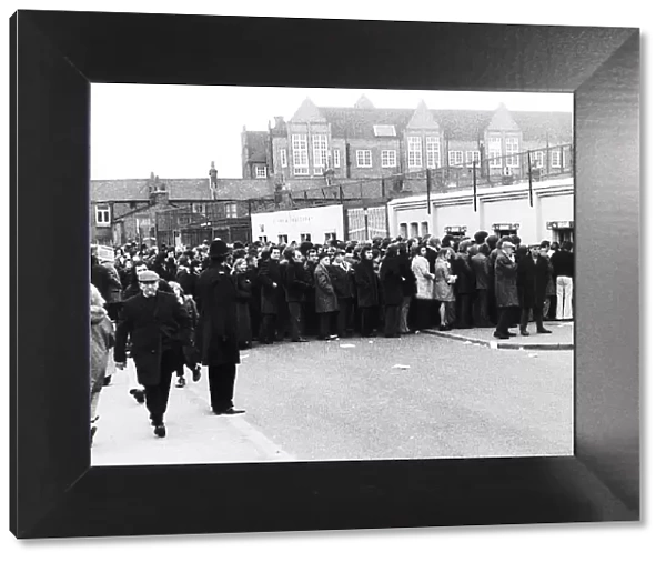 Millwall v Fulham 20th January 1974. The fans are queuing outside The Den for the first