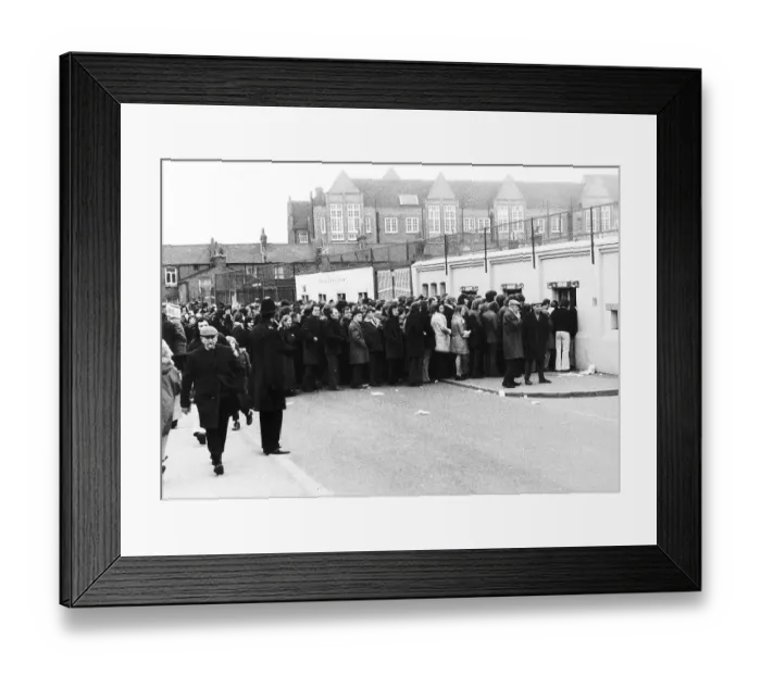 Framed Print : Millwall v Fulham 20th January 1974. The fans are queuing outside The Den for the first