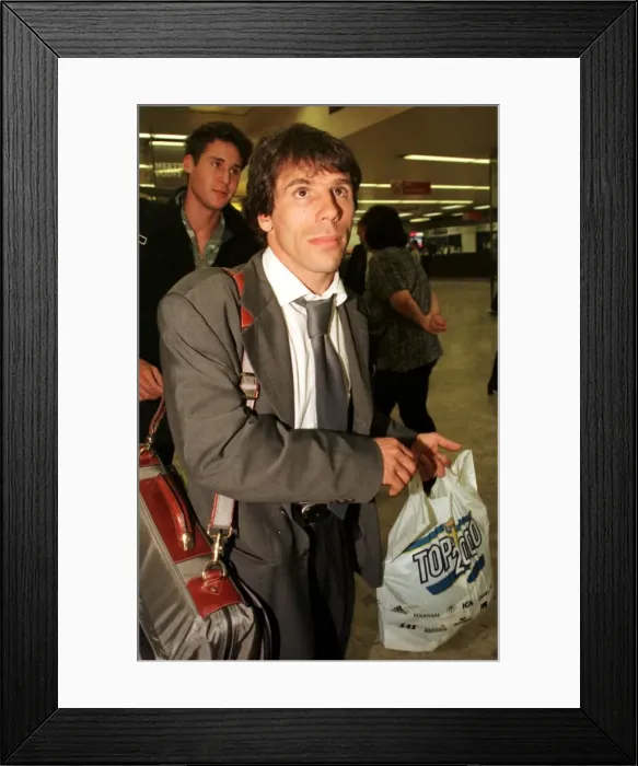 Framed Print : Chelsea footballer Gianfranco Zola at Heathrow Airport as the team arrives back Framed Print : Chelsea footballer Gianfranco Zola at Heathrow Airport as the team arrives back