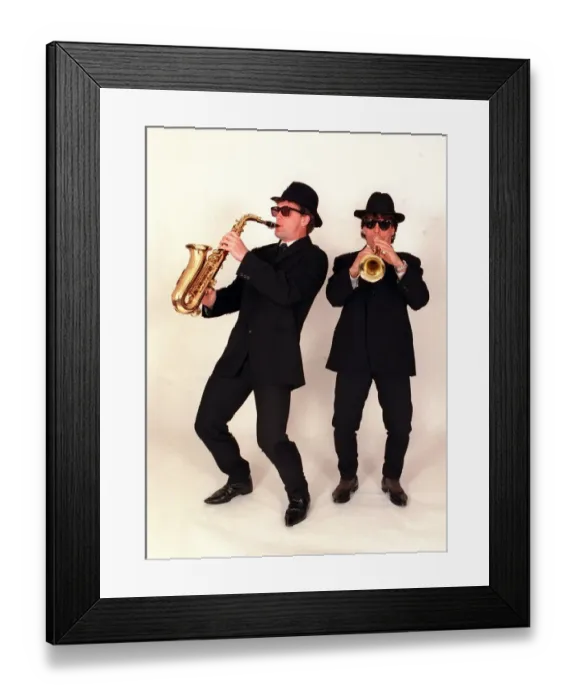 Framed Print : Chelsea footballers Gianfranco Zola and Mark Hughes dressed as the Blues Brothers Framed Print : Chelsea footballers Gianfranco Zola and Mark Hughes dressed as the Blues Brothers