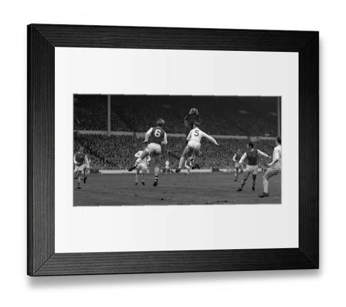Framed Print : League Cup Final 1968. Arsenal v. Leeds. Arsenal goalkeeper takes the ball out of