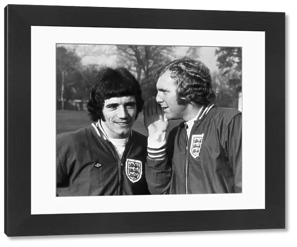 Kevin Keegan jokes with Englands captain Bobby Moore as the England squad train at