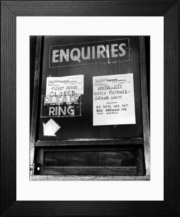 Framed Print : Signs at Manchester United ticket office informing fans of the postponement of their Framed Print : Signs at Manchester United ticket office informing fans of the postponement of their