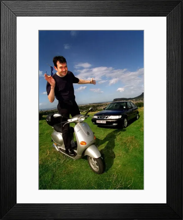 Framed Print : Grant Stott standing on Vespa scooter September 1998 Framed Print : Grant Stott standing on Vespa scooter September 1998