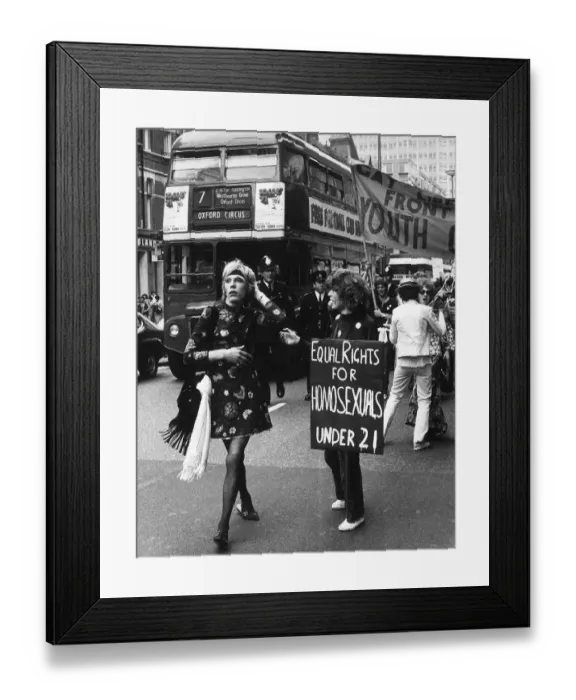 Framed Print : Gay Liberation March in Oxford Street Ginger a male walking past youth with placard Framed Print : Gay Liberation March in Oxford Street Ginger a male walking past youth with placard