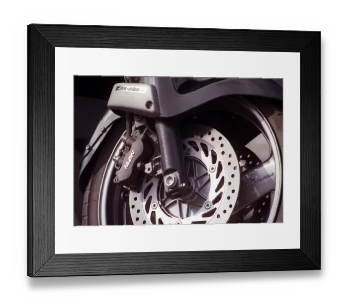 Framed Print : Honda Pan European motorcycle July 1998 Detail of suspension ventilated brake disc