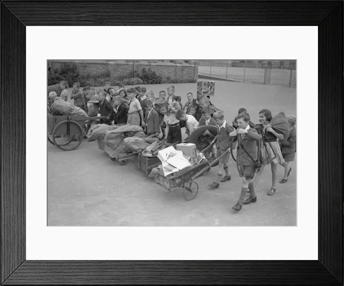 Framed Print : WW2 Children Evacuees Children carry and push along their belongings in improvised Framed Print : WW2 Children Evacuees Children carry and push along their belongings in improvised