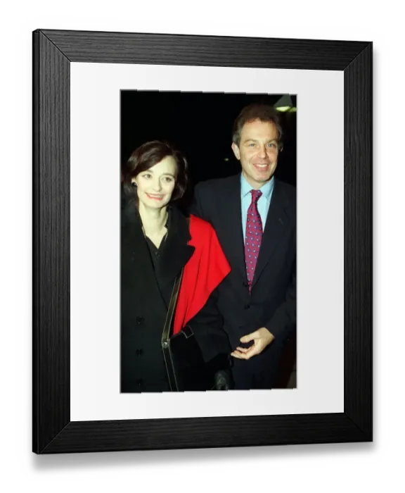 Framed Print : Tony Blair MP in red and blue tie and wife Cherie Blair in black coat with red scarf