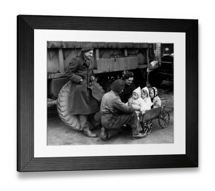 Framed Print : War: Invasion of France February 1945 British troops with German children