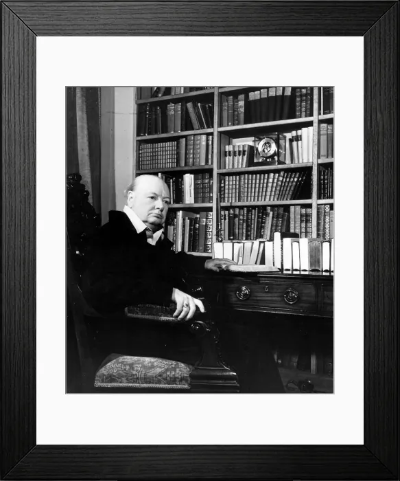 Framed Print : Winston Churchill sitting in front of a large bookcase 1951 Framed Print : Winston Churchill sitting in front of a large bookcase 1951
