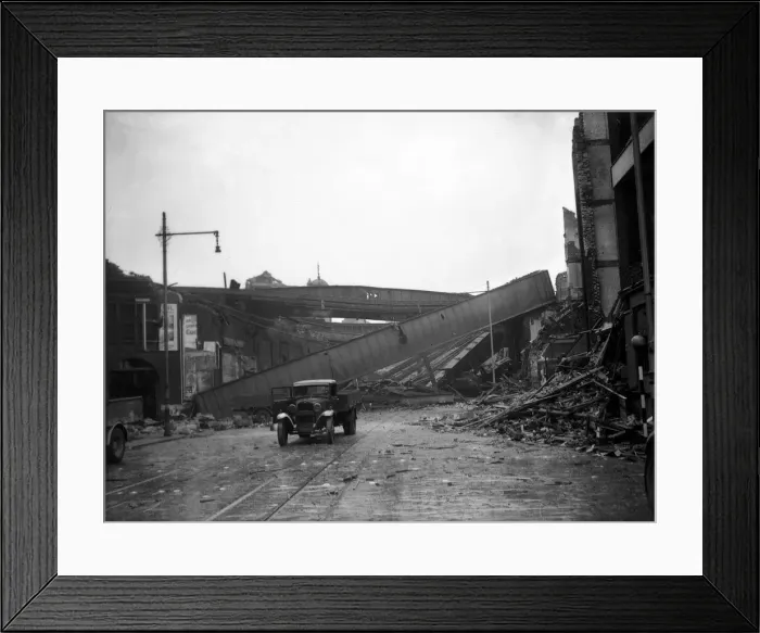 Framed Print : London Air Raid Bomb Damage WW2 An abandoned truck near the remains of a railway Framed Print : London Air Raid Bomb Damage WW2 An abandoned truck near the remains of a railway