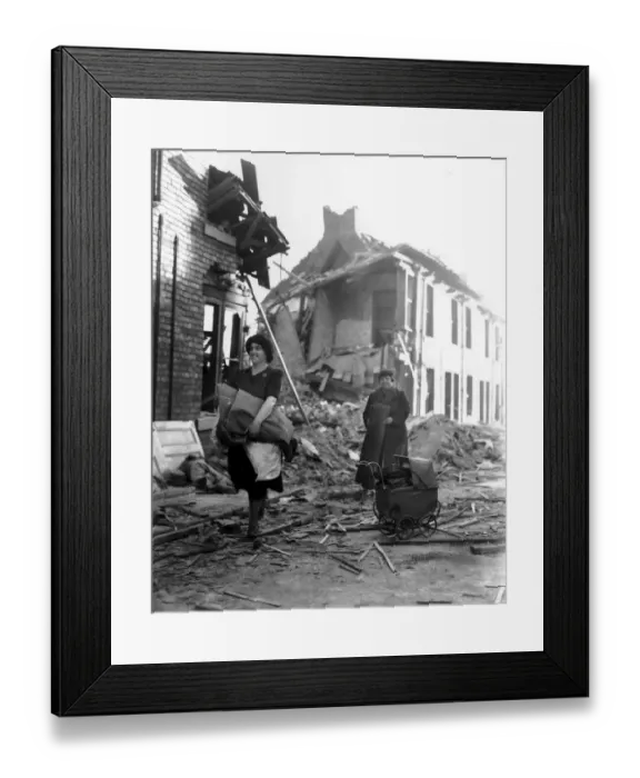 Framed Print : WW2 Air Raid Damage Bomb damage in Newcastle Civilians walk along the street