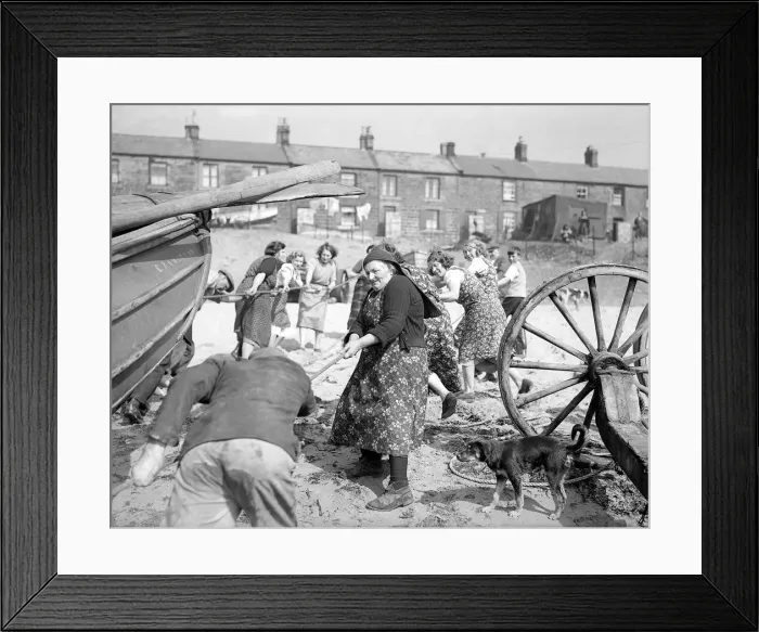 Framed Print : Fisherwomen of New Biggin, England hauling their boats ashore Women fulfilling Framed Print : Fisherwomen of New Biggin, England hauling their boats ashore Women fulfilling