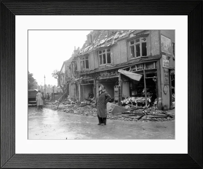 Framed Print : WW2 Air Raid Damage Air raid damage at Bridlington A woman stands in Framed Print : WW2 Air Raid Damage Air raid damage at Bridlington A woman stands in