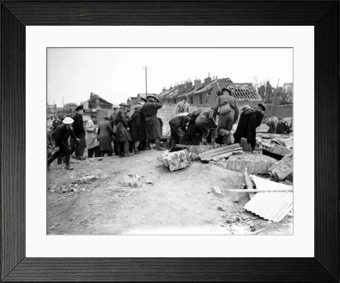 Framed Print : WW2 Air Raid Damage Bomb damage at Portsmouth The people of Portsmouth work
