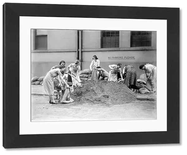 Ladies filling sandbags September 1939 Women fulfilling Mens work duties during