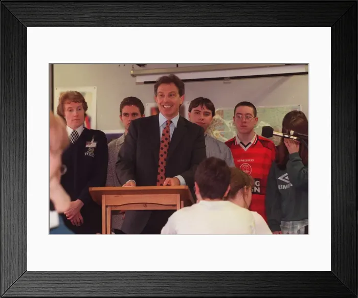 Framed Print : Tony Blair MP with children at Dyce Academy, standing at Lectern. 1990s Framed Print : Tony Blair MP with children at Dyce Academy, standing at Lectern. 1990s