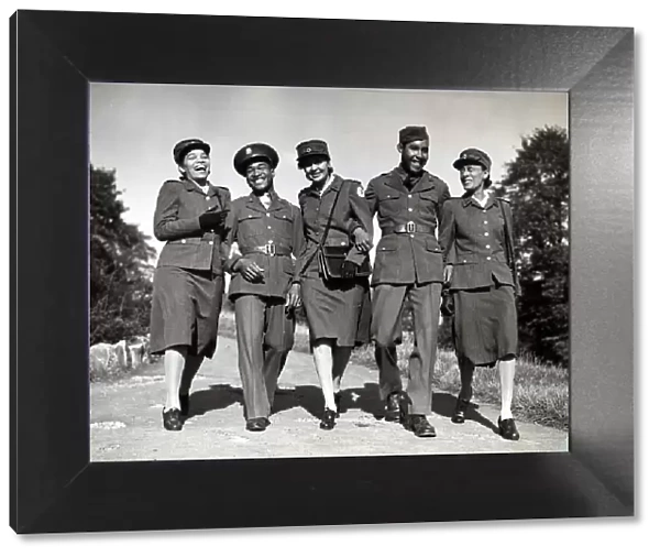 October 1942 WW2 Soldiers and Red Cross Workers The first three African American