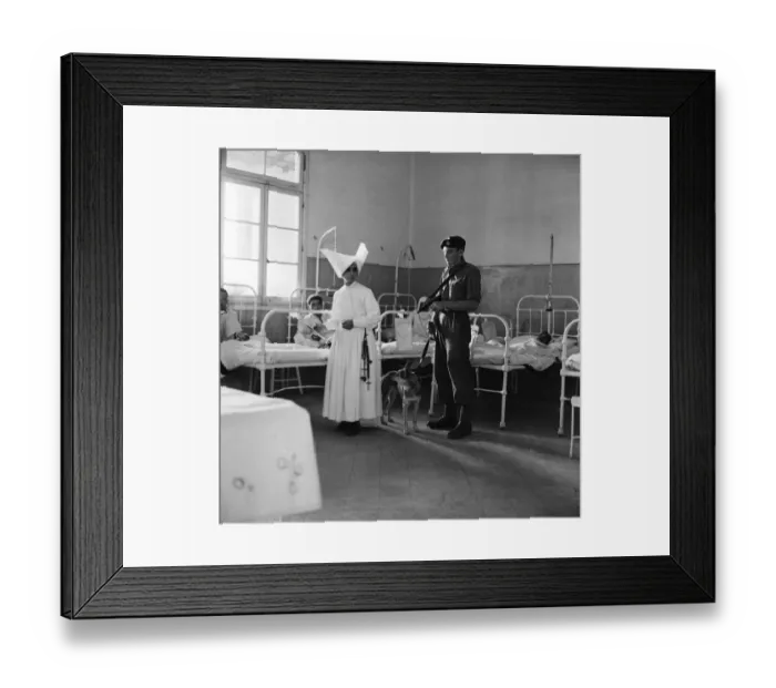Framed Print : Suez Crisis 1956 Royal Marine Andrew Hall accompanies Sister Mary Joseph on her
