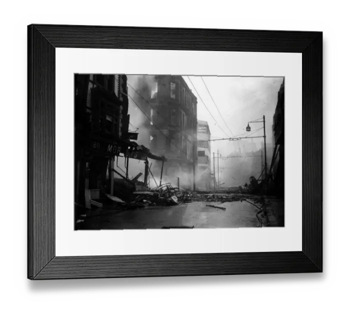 Framed Print : WW2 Air Raid Bomb Damage Portsmouth 1940 A firmens hose plays water on to