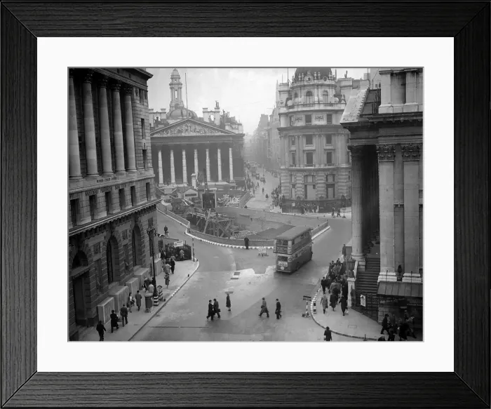Framed Print : City workers carry on with their daily routines walking past the damage caused by German Framed Print : City workers carry on with their daily routines walking past the damage caused by German