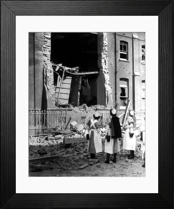 Framed Print : WW2 Air Raid Damage Nurses looking at a bombed hospital building during the blitz Framed Print : WW2 Air Raid Damage Nurses looking at a bombed hospital building during the blitz