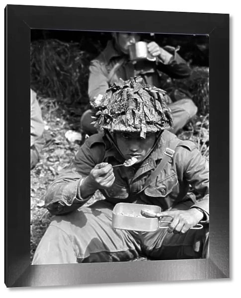 Gurkha Troops during a Nuclear Excercise - August 1962 A gurkha soldier eats during