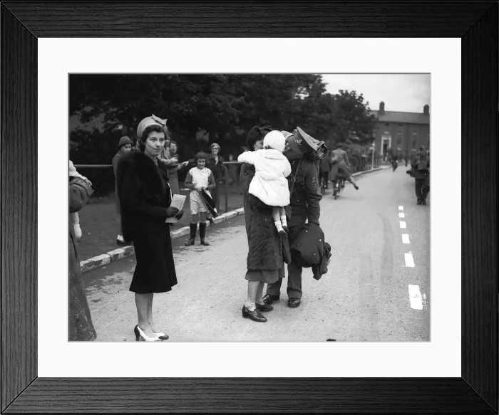 Framed Print : WW2 British Soldiers in England march along the road past families Framed Print : WW2 British Soldiers in England march along the road past families