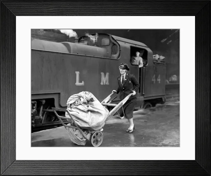 Framed Print : Woman Railway Porter during WW2 - 1941 Women doing mens jobs during the war