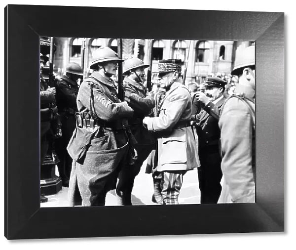 Peace Celebrations in Paris - Marshall Fock decorates a French soldier