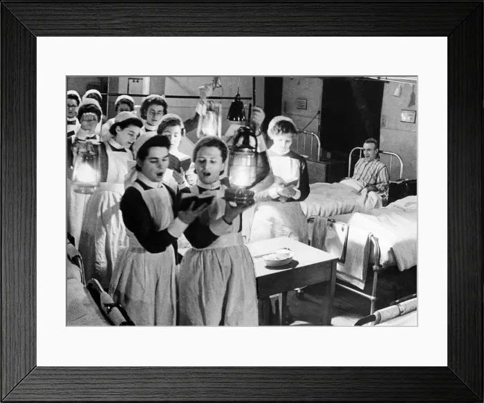 Framed Print : Scene at Westminister Hospital on Christmas Eve - 1940 Nurses walk through wards Framed Print : Scene at Westminister Hospital on Christmas Eve - 1940 Nurses walk through wards