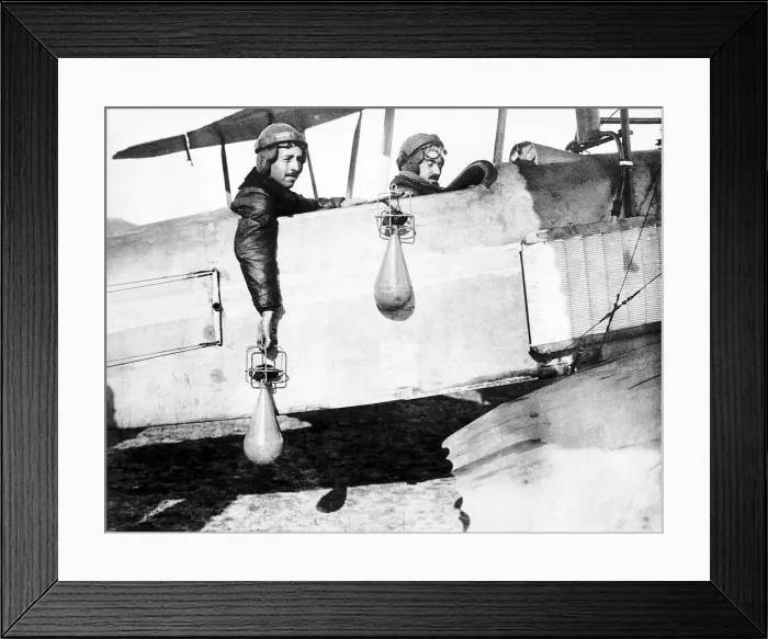Framed Print : British airmen drop handbombs from their bi-plane. 1914 World War One Framed Print : British airmen drop handbombs from their bi-plane. 1914 World War One