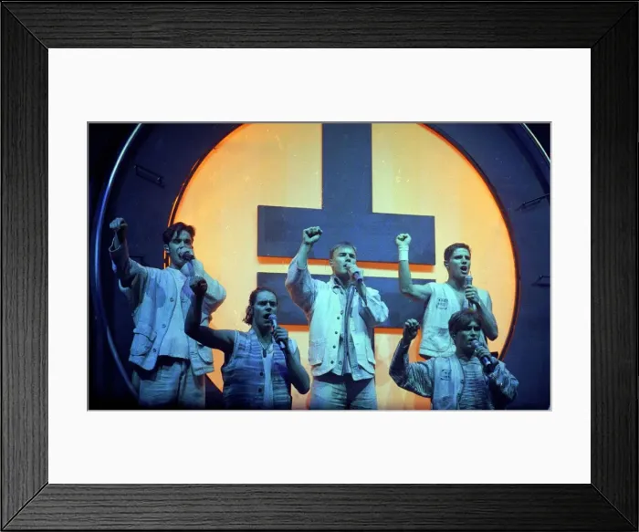 Framed Print : Pop group Take That performing live on stage during a concert October 1993