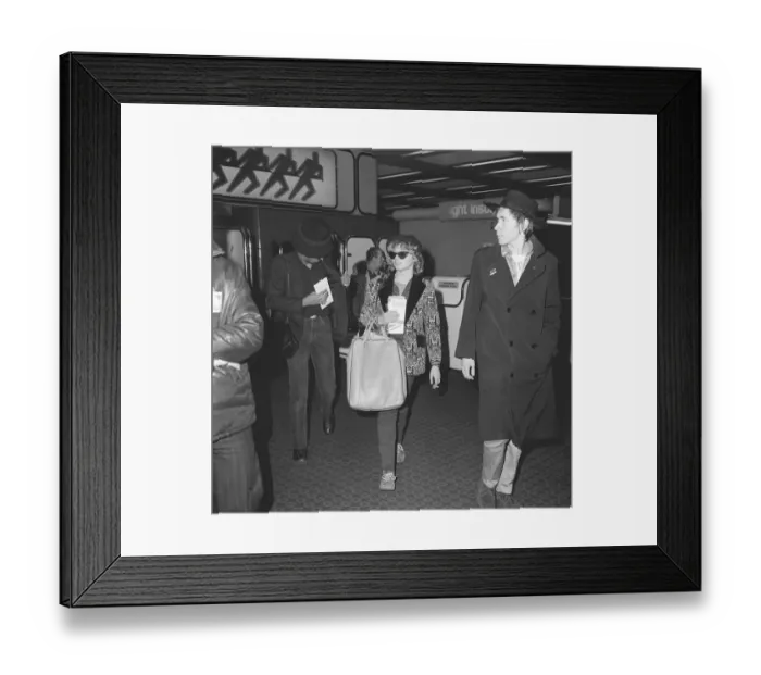 Framed Print : Johnny Rotten of the Sex Pistols January 1978 leaving Heathrow Airport for Miami