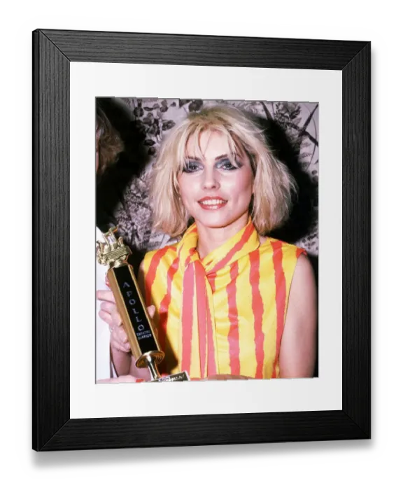 Framed Print : Deborah Harry of the pop group Blondie holding Apollo Theatre Glasgow trophy