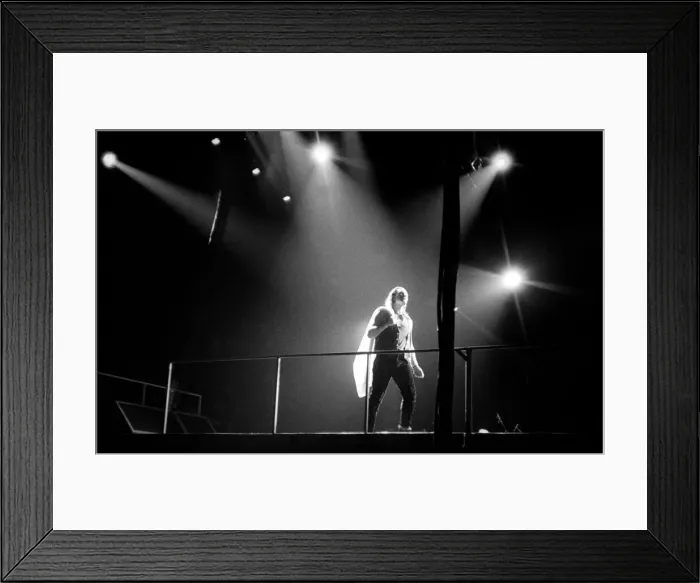 Framed Print : Rock group U2 in concert in USA - May 1987 Bono under the spotlight