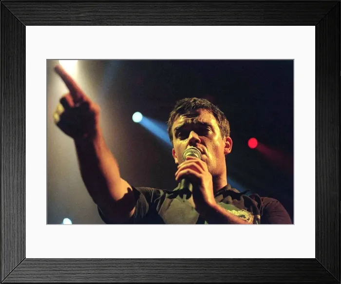 Framed Print : Robbie Williams sings at his concert in Aberdeen. February 1999