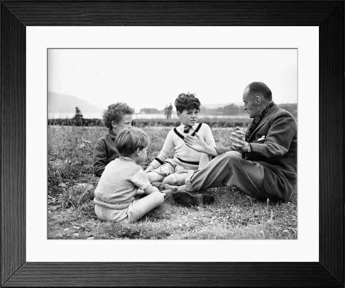 Framed Print : Sir Malcolm Campbell seen here talking to some young admirers inbetween tests he is Framed Print : Sir Malcolm Campbell seen here talking to some young admirers inbetween tests he is