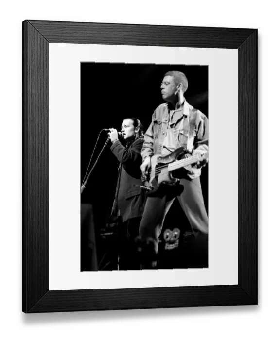 Framed Print : Rock group U2 in concert in USA - May 1987 Bono and Adam Clayton